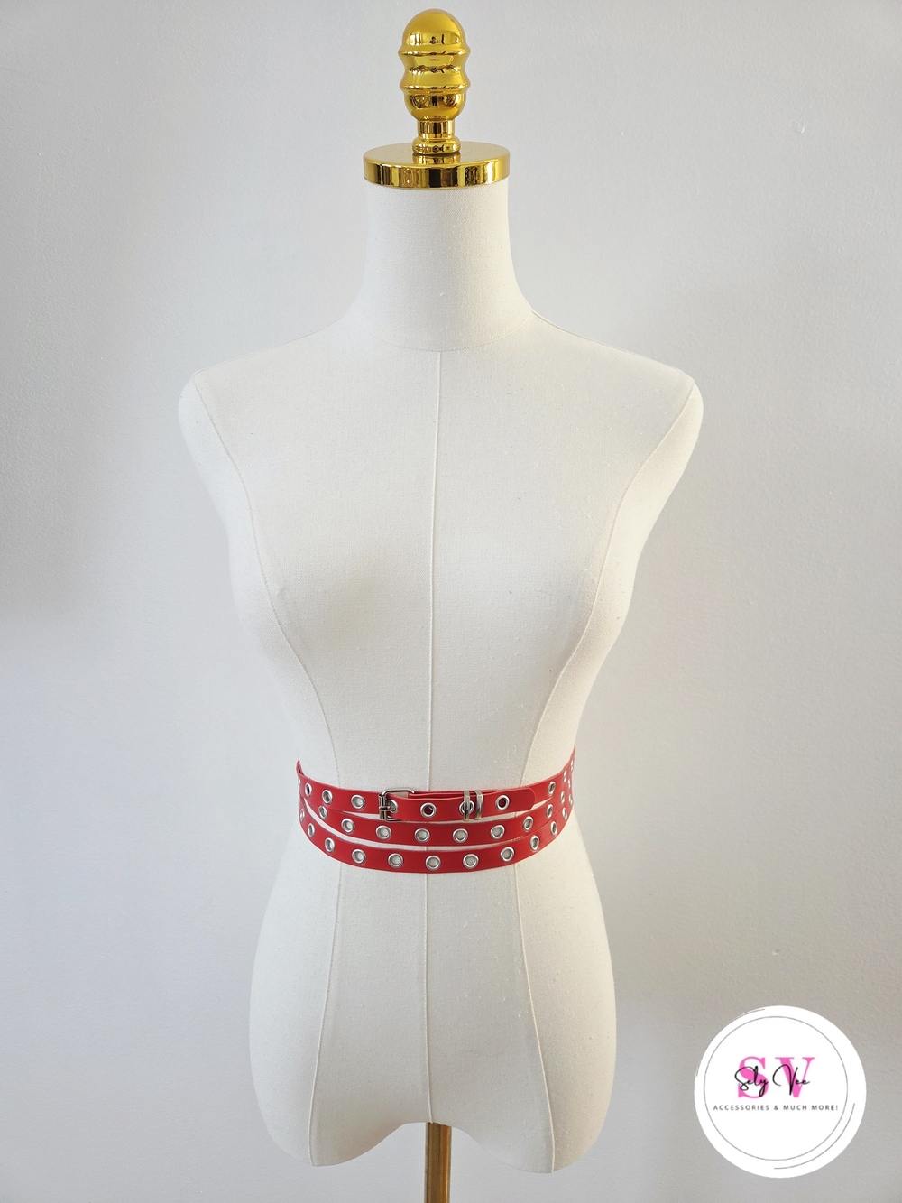 Long wrap around red belt with silver eyelets